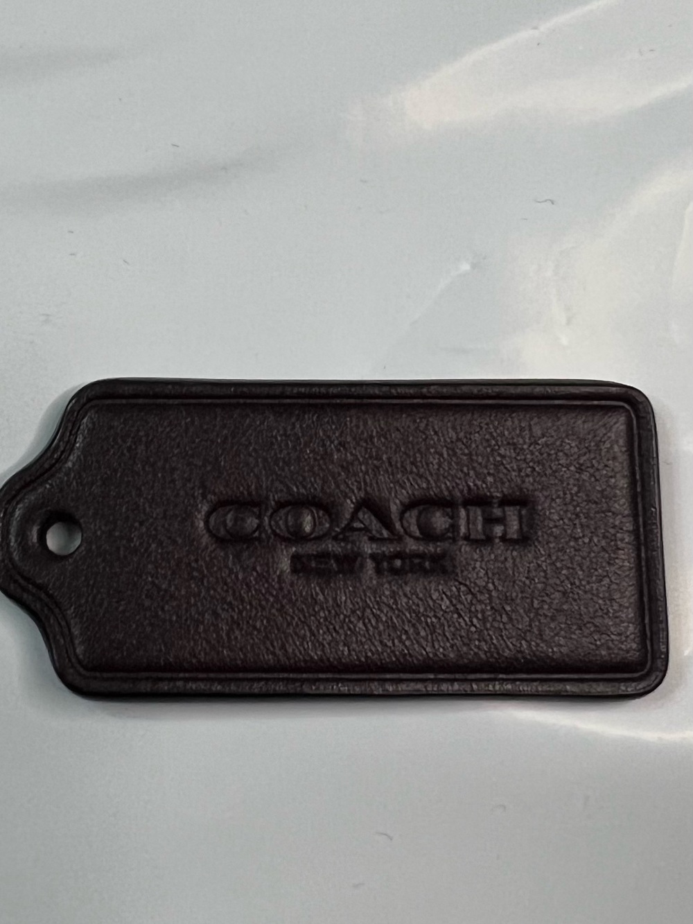 COACH dark burgandy Leather Key/Card Tag with Embossed Logo
